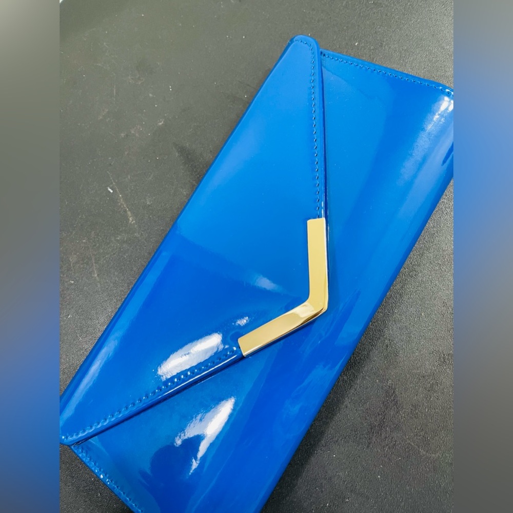 Blue clutch for wedding, party.Like new in good condition no scratches.